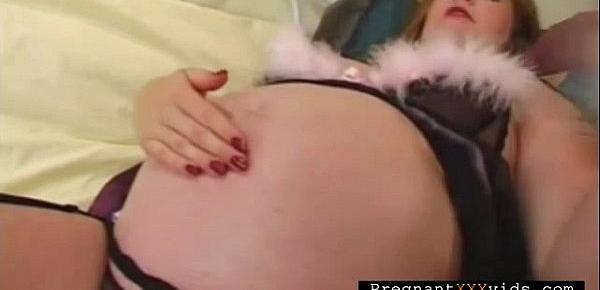  Mature pregnant plays with herself